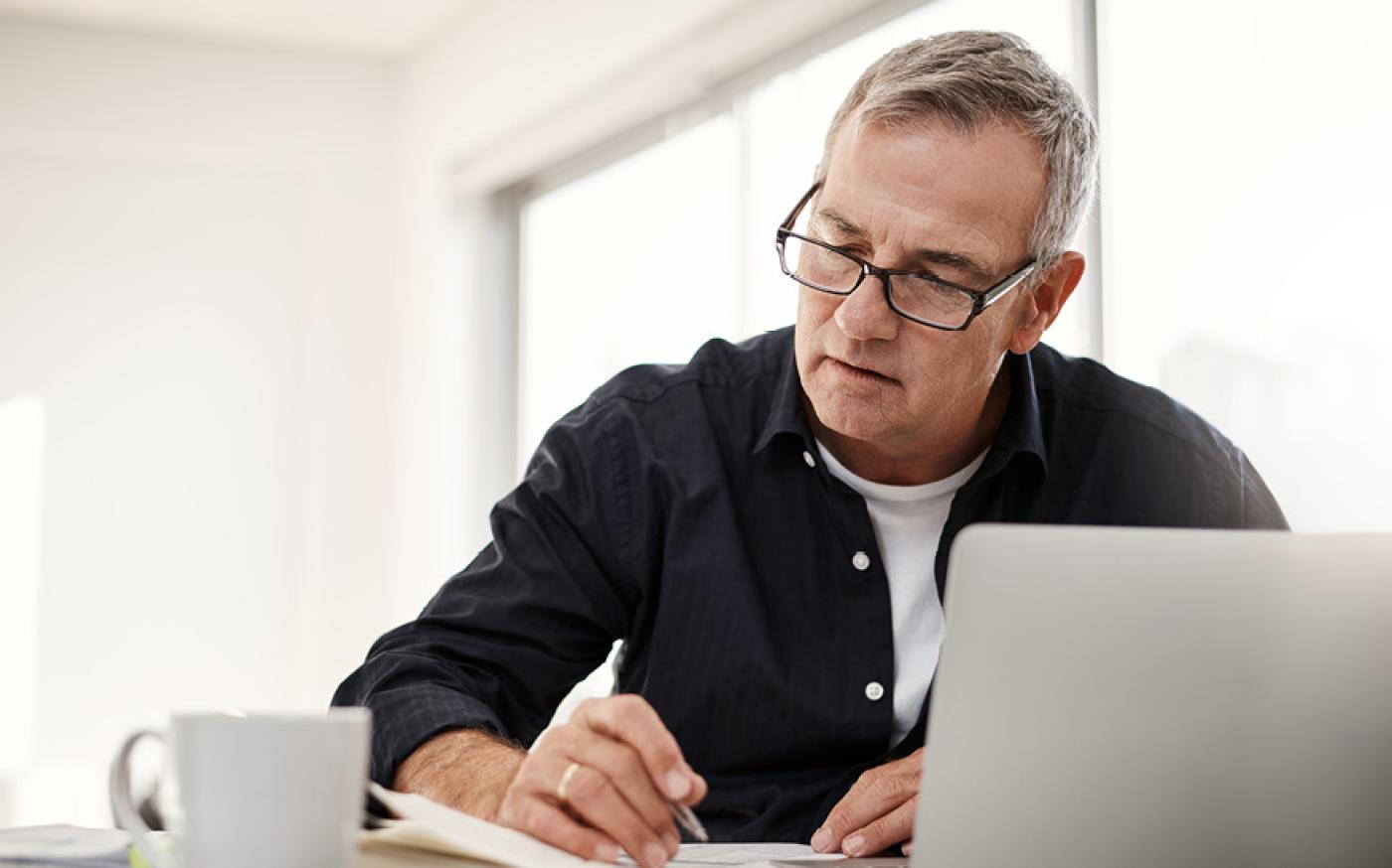 Man at desk with laptop